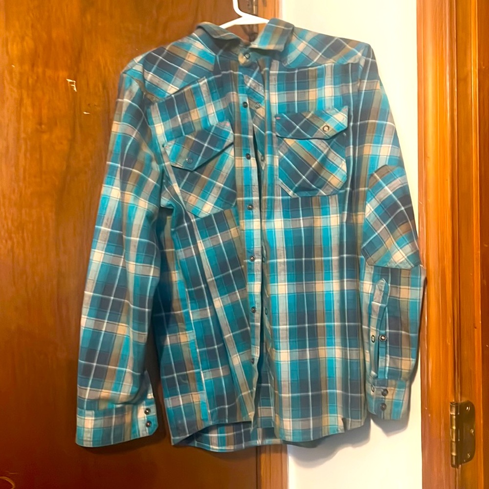 Never worn. Nice thick flannel. Rugged.